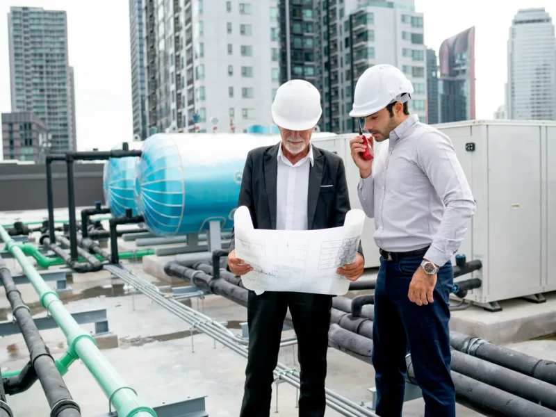 young-engineer-man-use-walkie-talkie-to-contact-wi-2025-03-09-22-10-27-utc